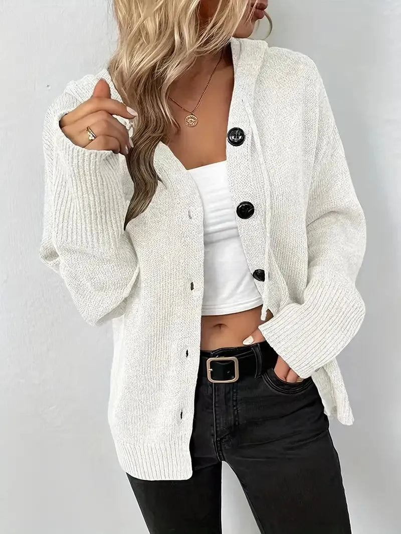 A solid colour loose-fit hooded cardigan sweater made from thick cotton fabric.