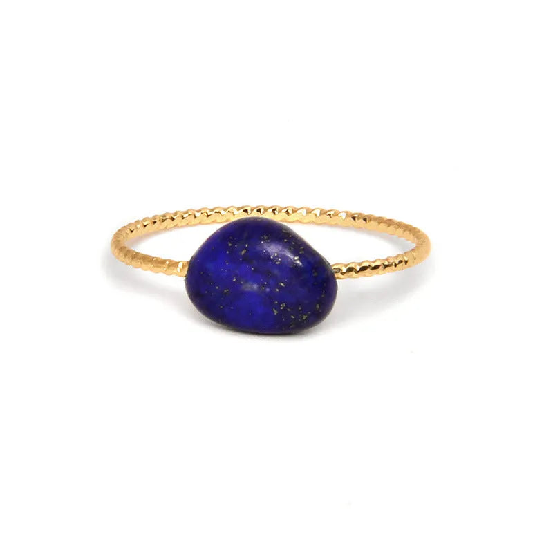 A geometric-shaped agate ring for women in an original design, showcasing natural stone colouration.