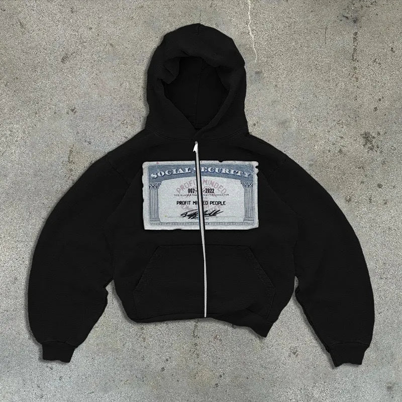 Black loose-fit hoodie jacket with a front zipper and zippered kangaroo pocket on a person.