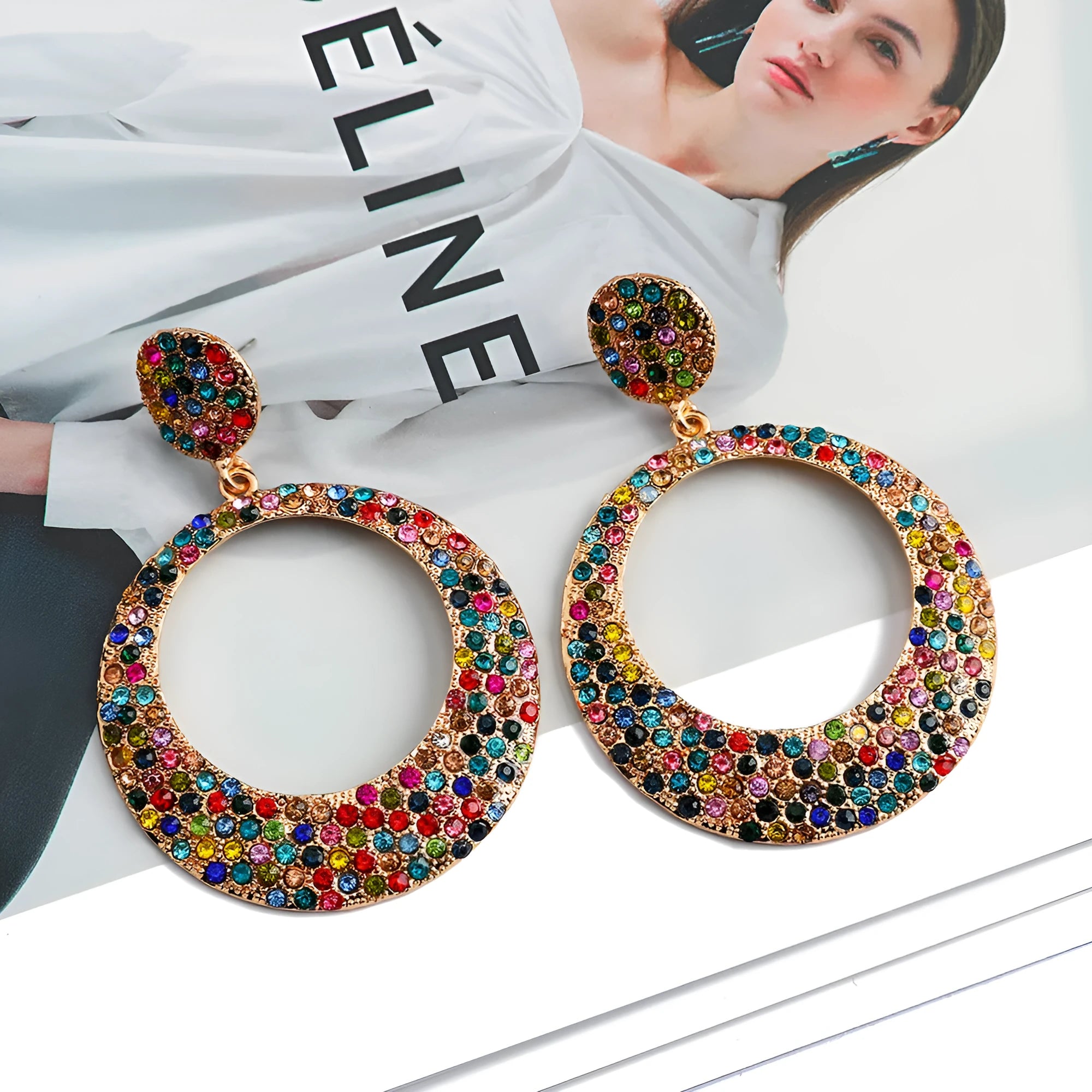 Coloured cartoon-style alloy earrings with a large round pendant and diamond design.