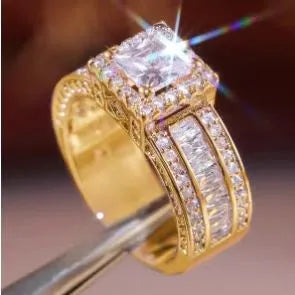 Geometric round women's alloy ring on a hand, showing angular design in gold or white electroplated finish.
