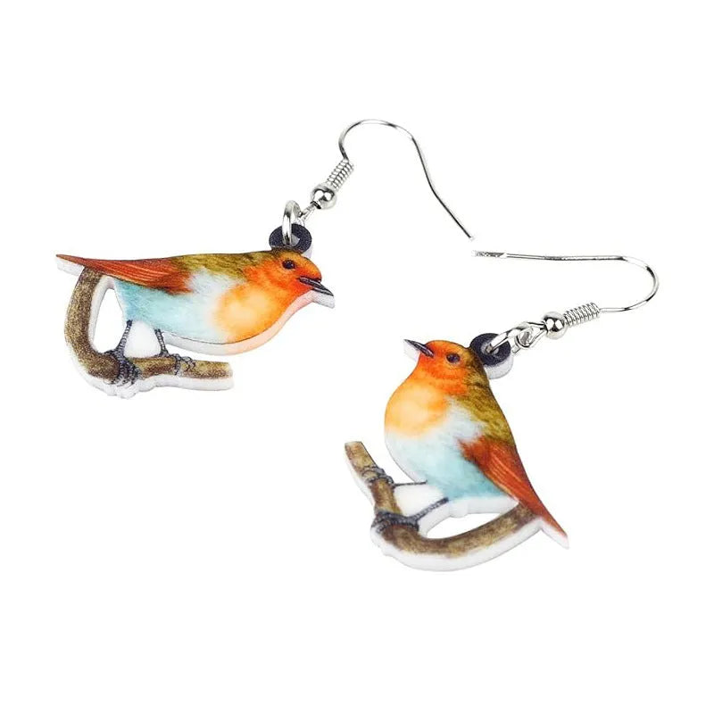 Geometric Blue Tit bird acrylic drop earrings with surgical steel posts on a white background.