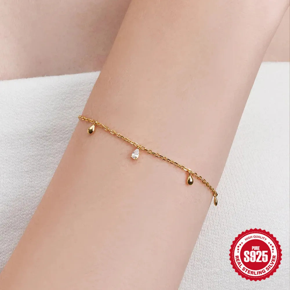 Gold-coloured S925 sterling silver bracelet with a water drop diamond pendant