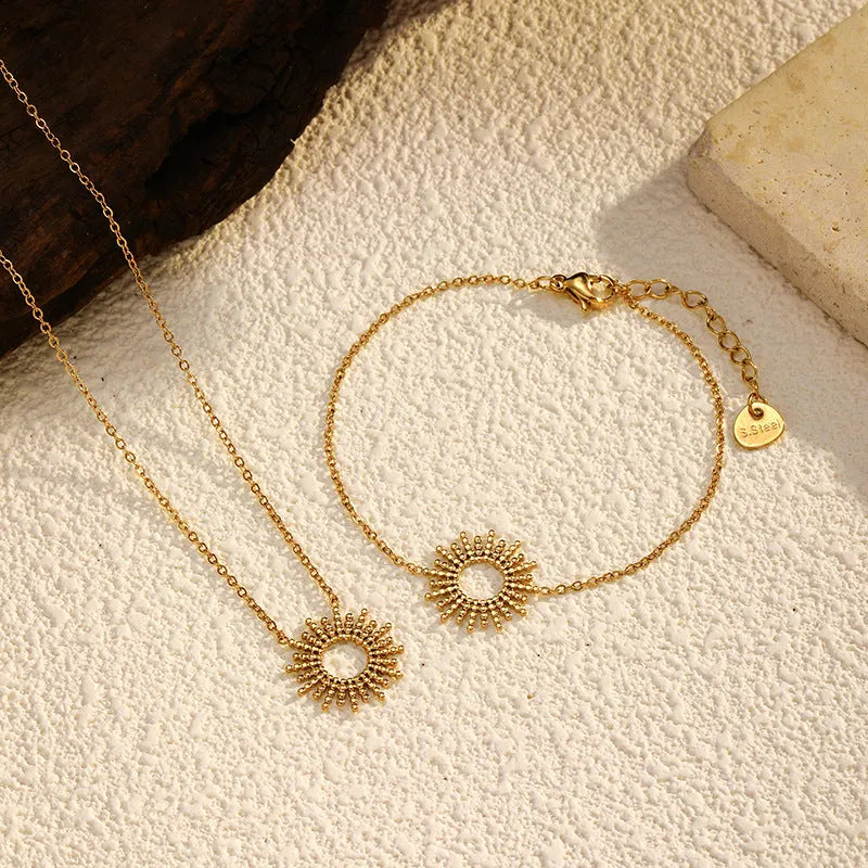 Sunflower Series women's 14K gold-plated geometric chain necklace and bracelet set.