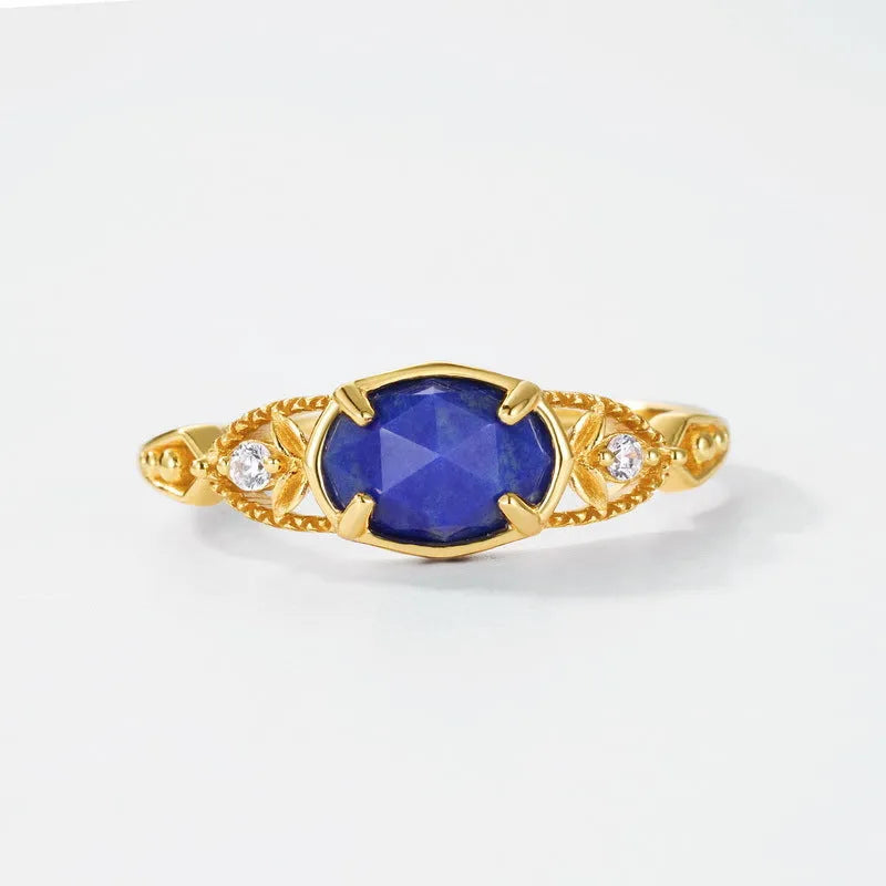Silver geometric ring with oval lapis lazuli stone showing blue forest night sky pattern