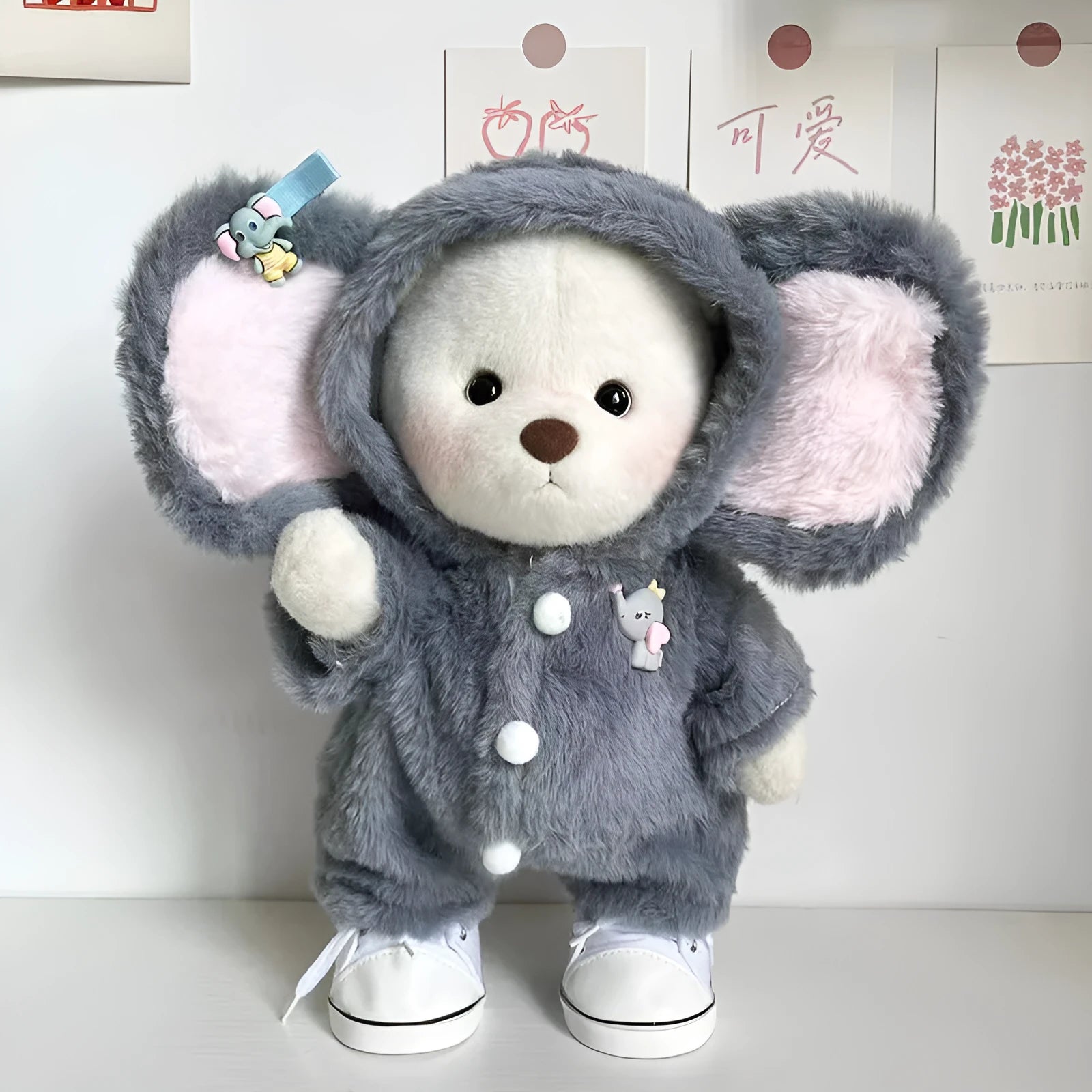 Grey elephant print plush jumpsuit outfit for a 30cm tall teddy bear or doll.