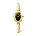 Oval disk bracelet watch with mineral glass mirror and rose gold clasp on a light background
