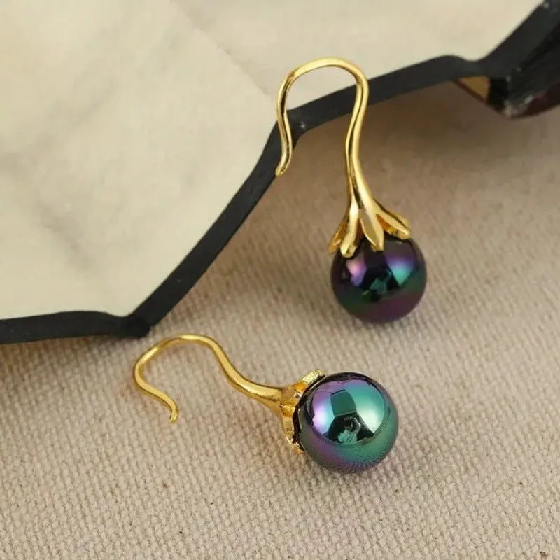 Gold electroplated retro fashion women's earrings with alloy construction and personalised creative design