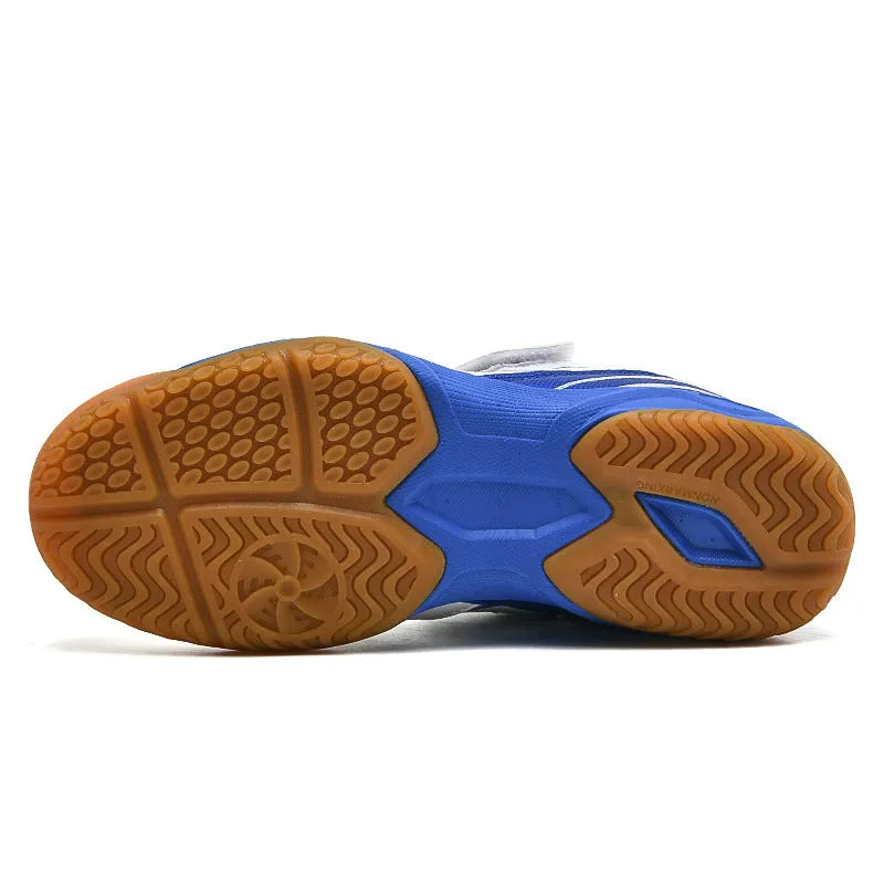 White and blue breathable badminton shoes with a low-top casual design and ribbed sole.