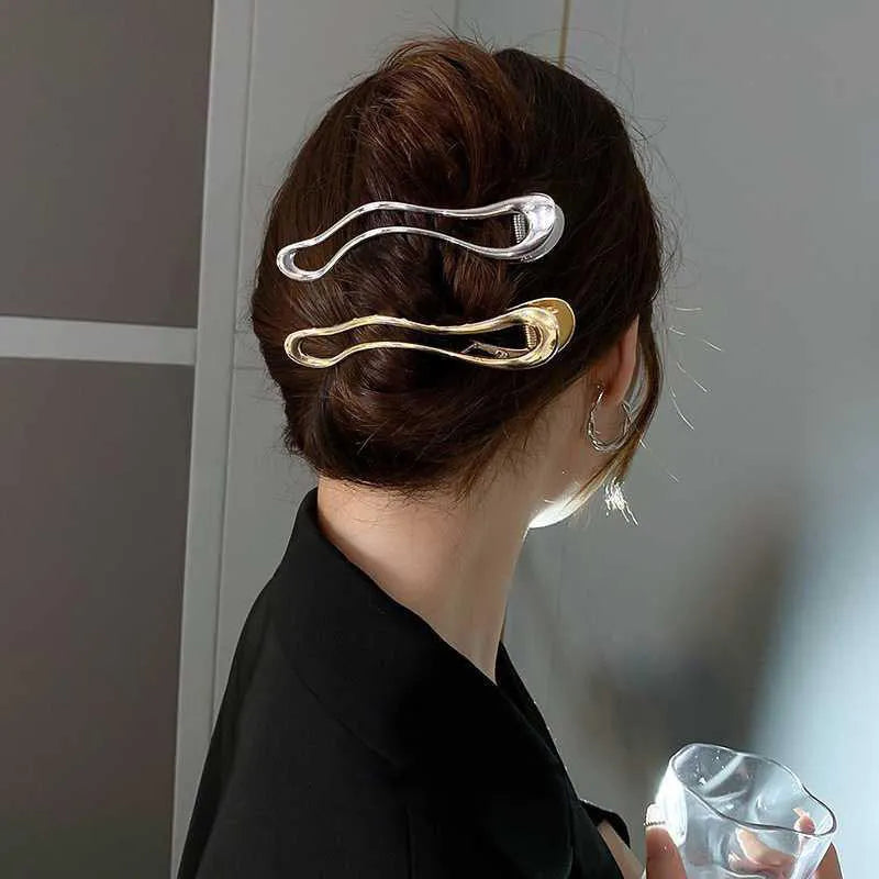 Women's zinc alloy hair barrettes in gold and silver with arc, square, and triangle shapes