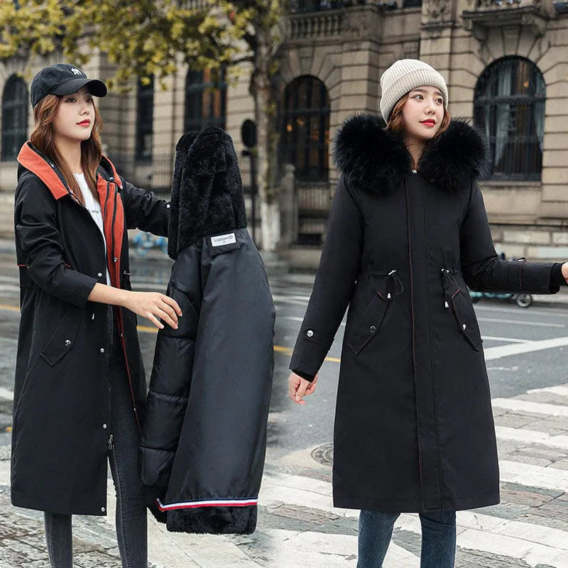 Women's long beige trench coat with two-way zip and cotton padding, shown in extended length.