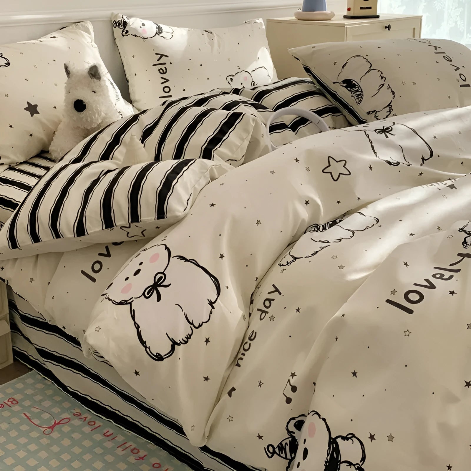 Cartoon dog print on a pure cotton duvet cover and pillowcase from a four-piece bedding set.