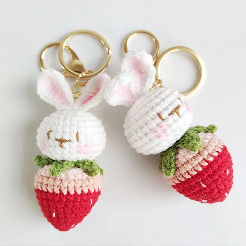 Hand-woven white rabbit strawberry pendant charm made from colourful doll wire on a keyring.