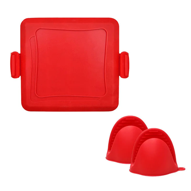 Red silicone baking tray and matching heat-resistant gloves set on kitchen counter