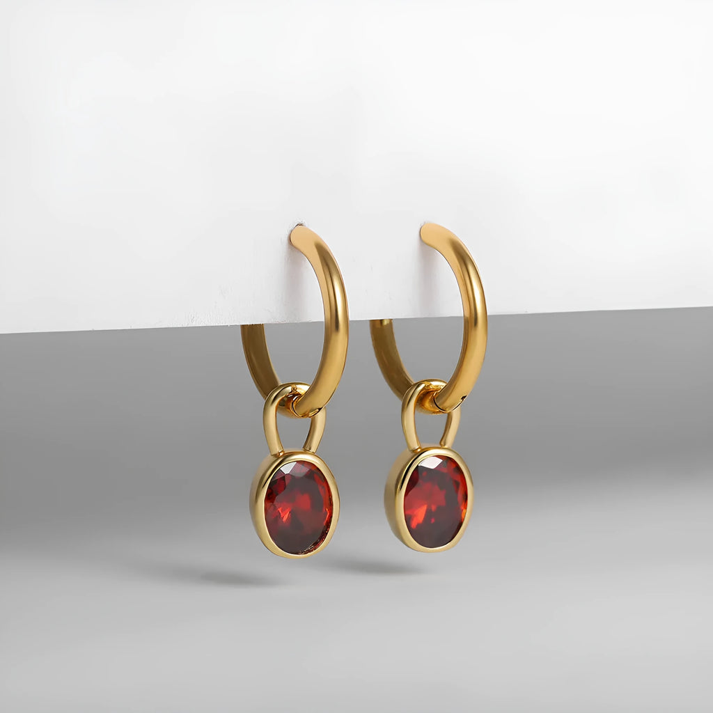 Women's retro-style oval zircon stud earrings in copper, shown in an army green colour variant.