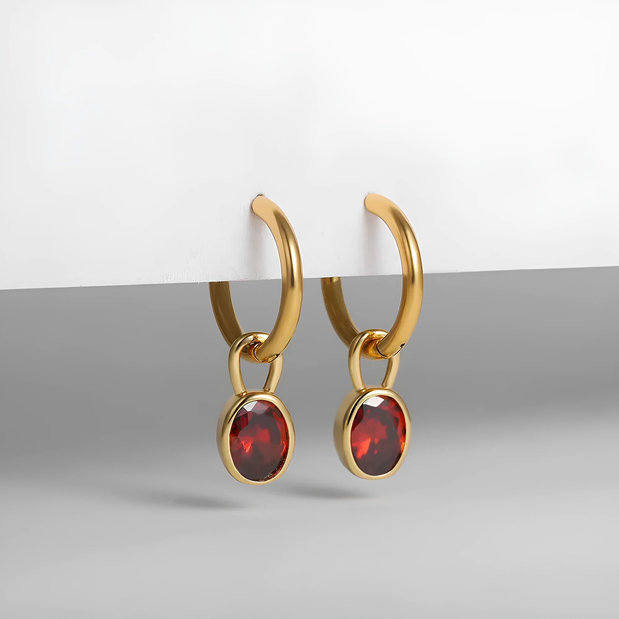 Women's retro-style oval zircon stud earrings in copper, shown in an army green colour variant.