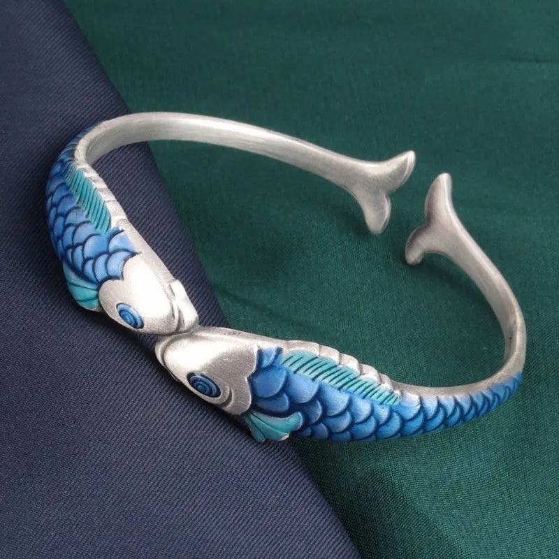 Ethnic style blue carp bracelet with silver electroplated copper finish, 60mm inner diameter, 13mm width