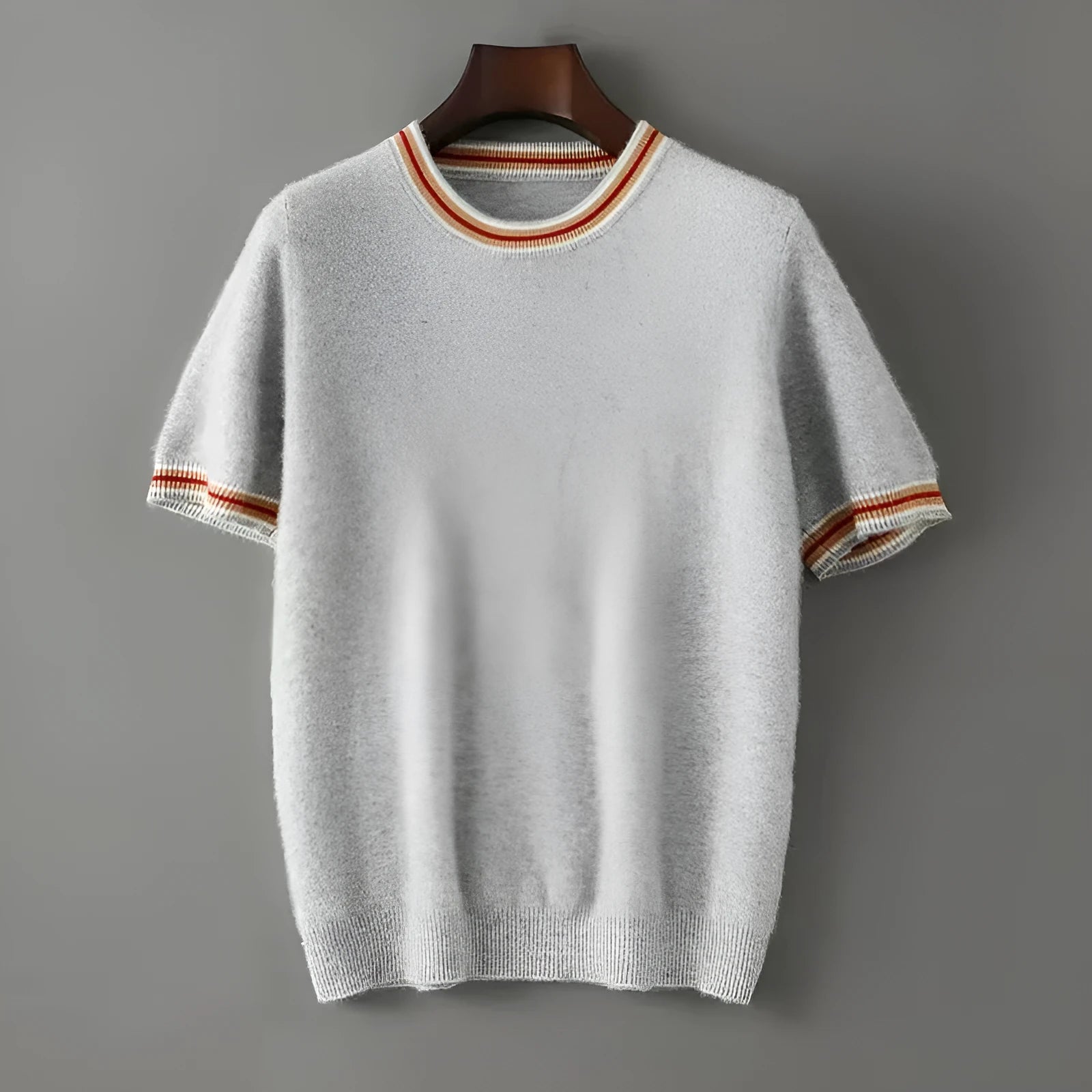 Men's grey pure wool short sleeve pullover sweater with a round neck on a hanger