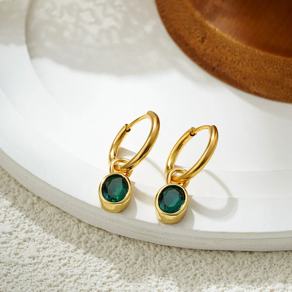 Women's retro-style oval zircon stud earrings in copper, shown in an army green colour variant.