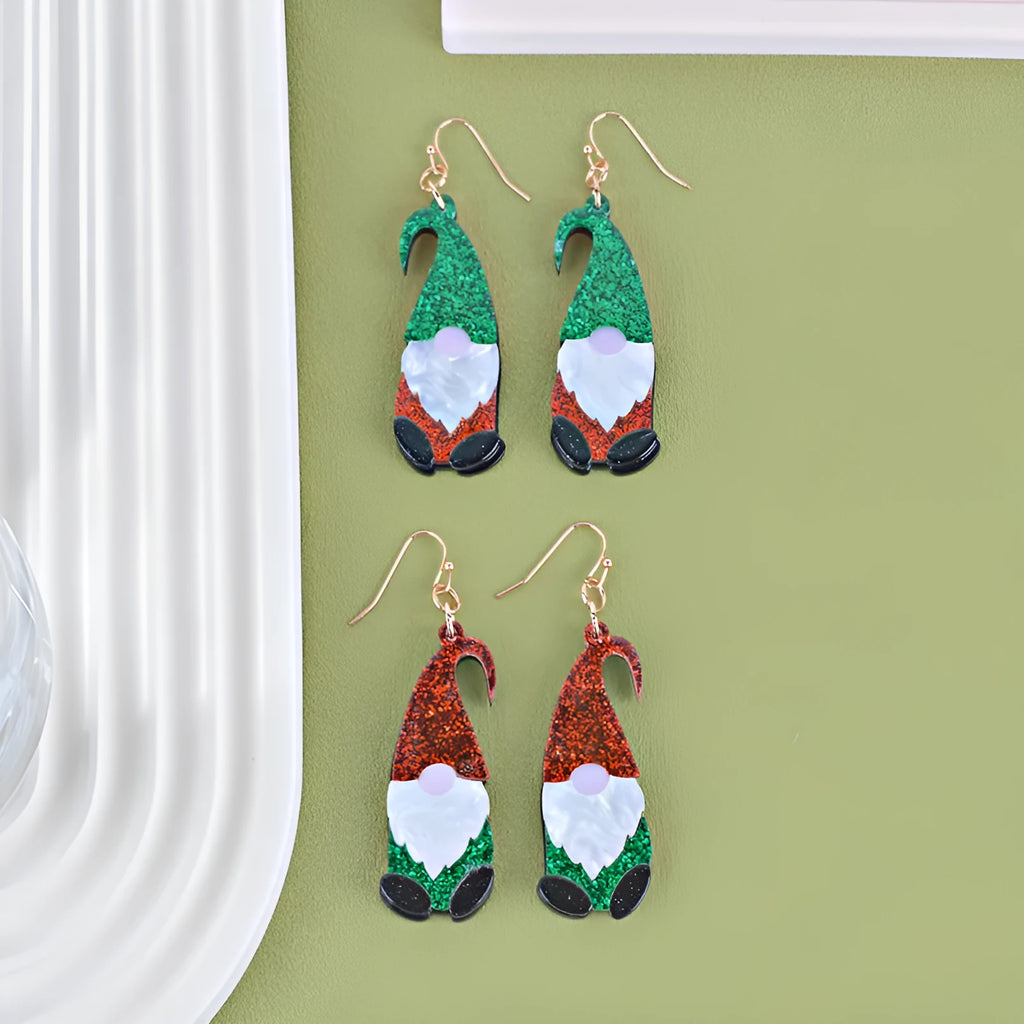 Santa Claus cartoon character acrylic fashion earrings on red, green, and mixed backgrounds.