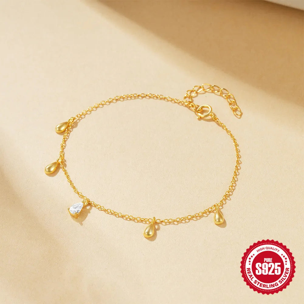 Gold-coloured S925 sterling silver bracelet with a water drop diamond pendant