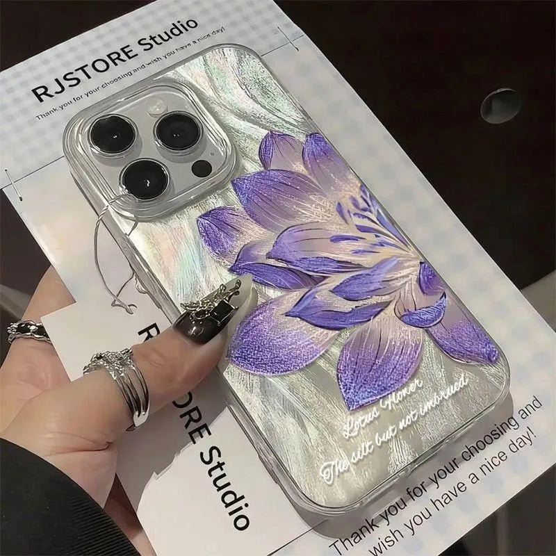 Hard polycarbonate iPhone case with blue lotus floral IMD pattern showing screen and camera cut-outs