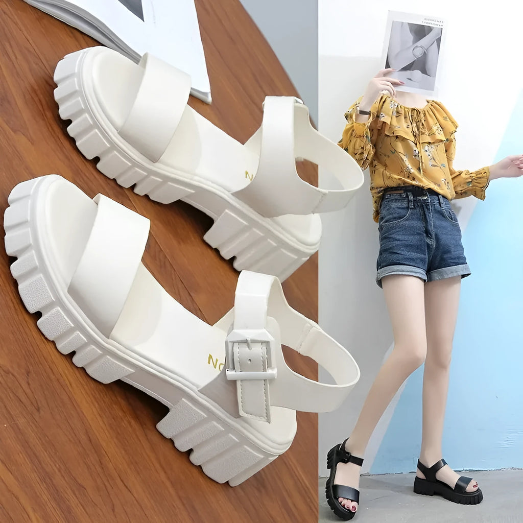 Women's beige peep toe platform sandals with an ankle-strap buckle on a white background.