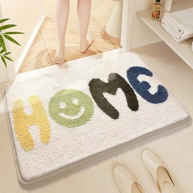 Square rainbow pattern floor mat in sky sea colour with a flat polyester weave and plastic backing
