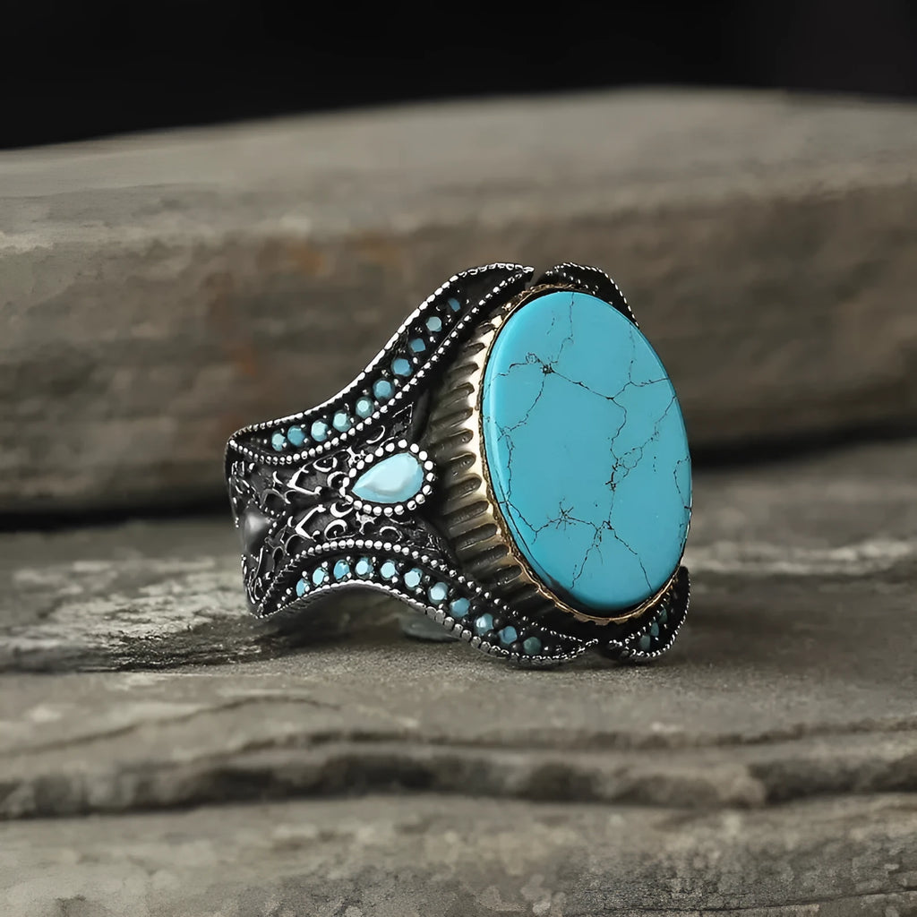 Men's turquoise antique silver alloy ring showing round band with simple design