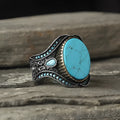 Men's turquoise antique silver alloy ring showing round band with simple design