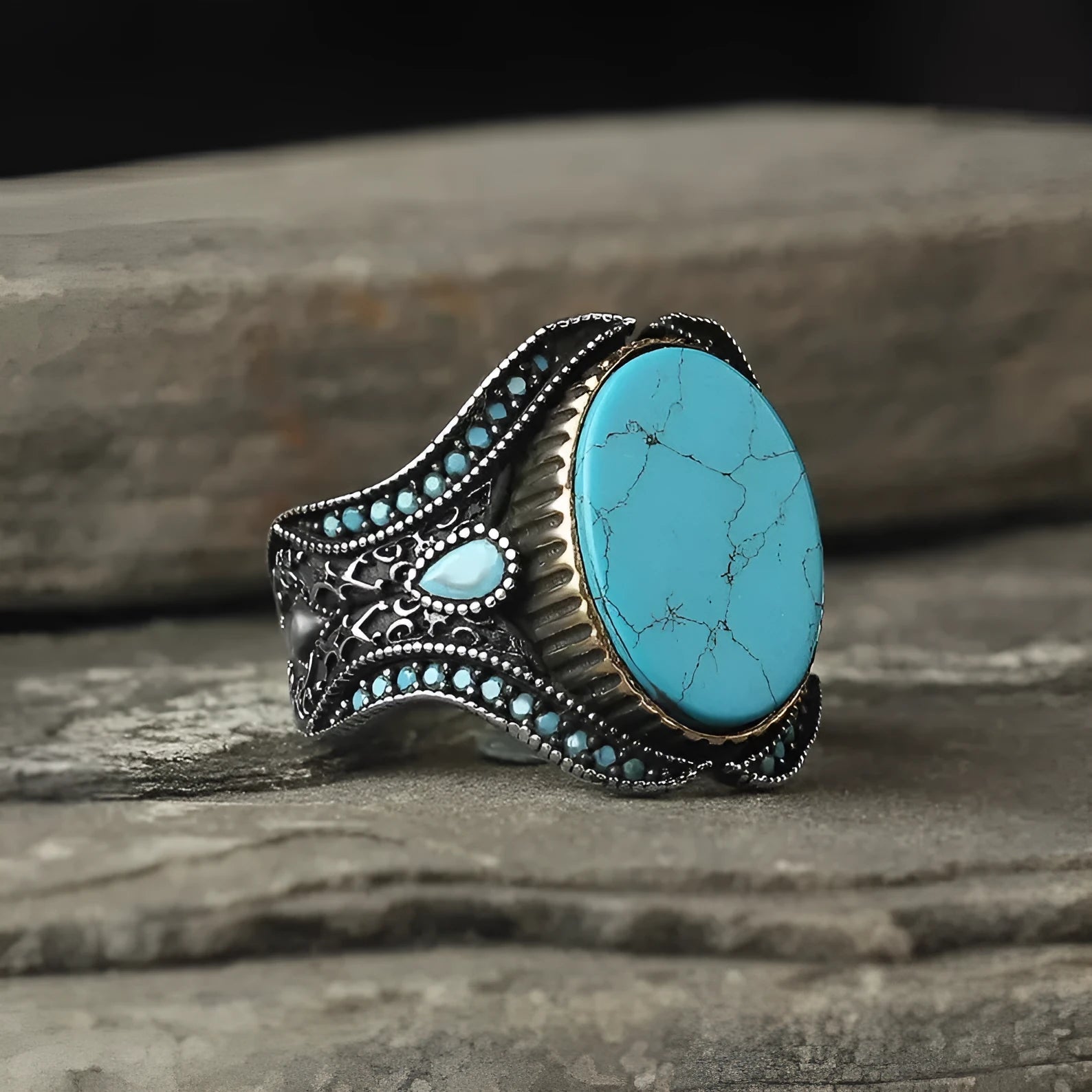 Men's turquoise antique silver alloy ring showing round band with simple design