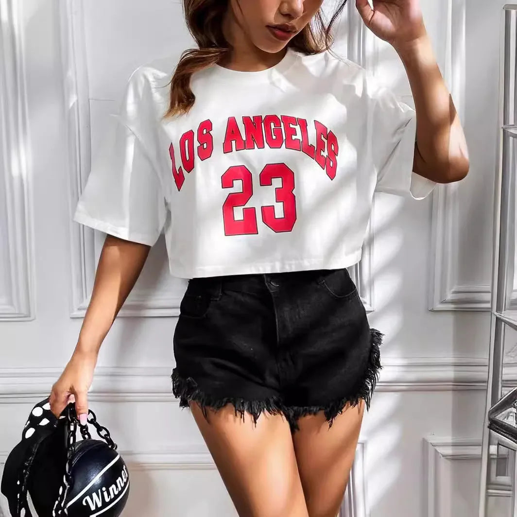 Black cotton crop t-shirt with printed white English letters, short sleeves, and a loose casual fit.