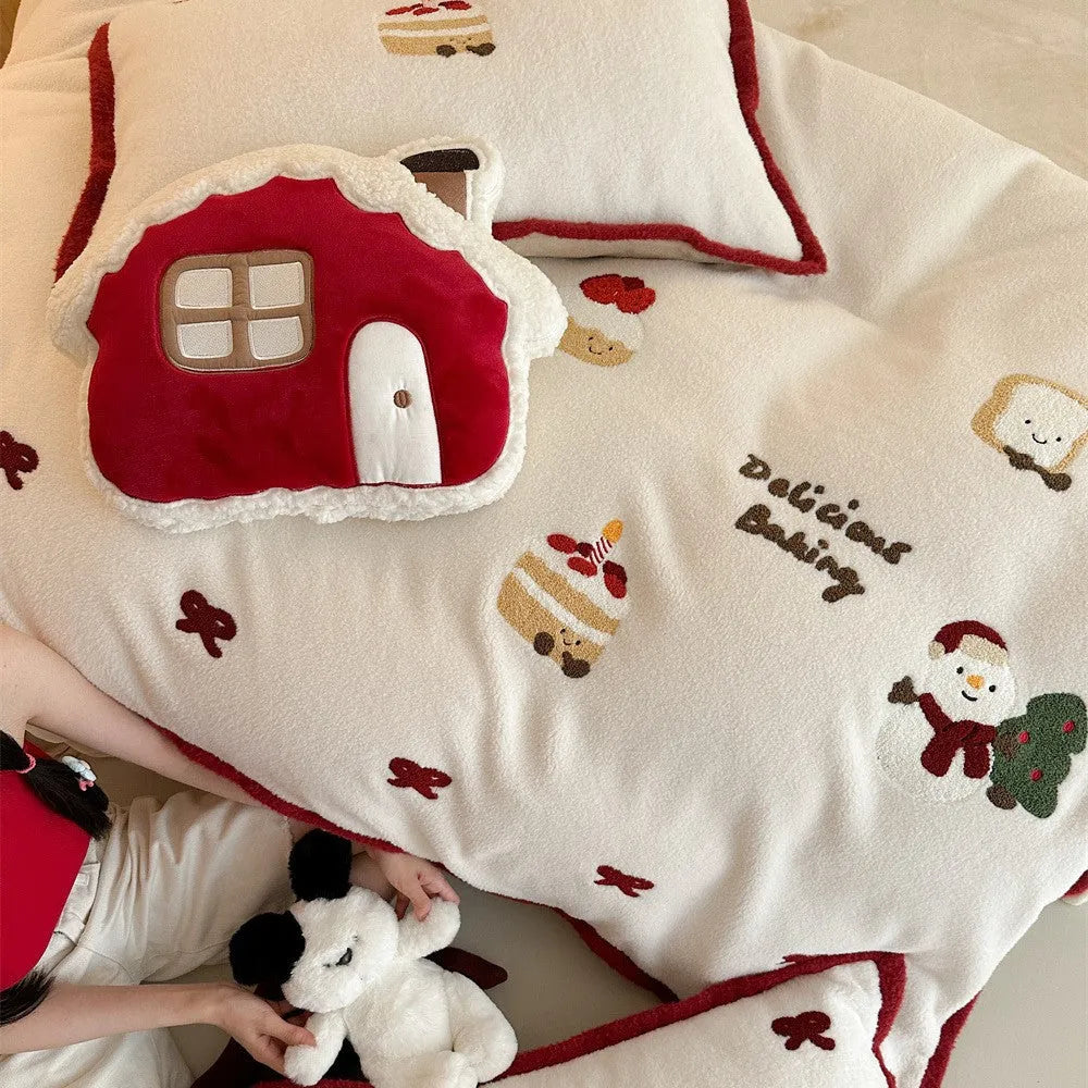Winter Christmas cartoon bedding four-piece set with snowman milk pastry pattern on bed