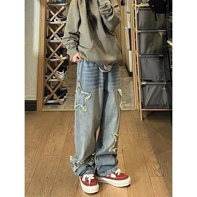 Blue high-waist straight-leg women's jeans on a model, showing the front and side fit.