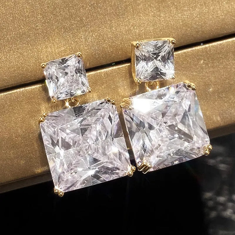 Geometric square design copper earrings with quadrilateral shape in gold or white gold finish