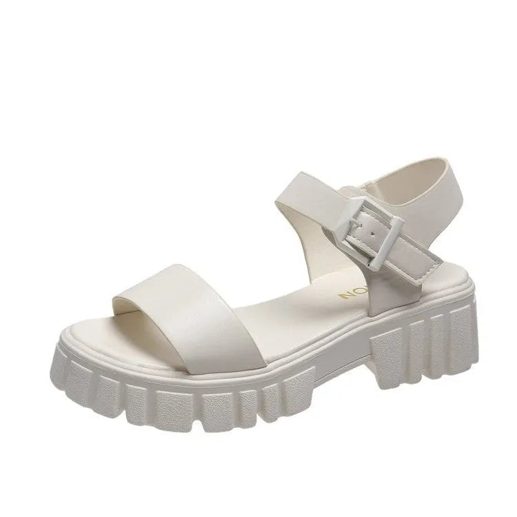 Women's beige peep toe platform sandals with an ankle-strap buckle on a white background.