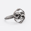 Personalised titanium steel double snake ring in steel colour on a grey background.