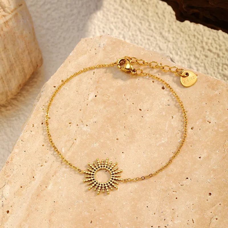 Sunflower Series women's 14K gold-plated geometric chain necklace and bracelet set.
