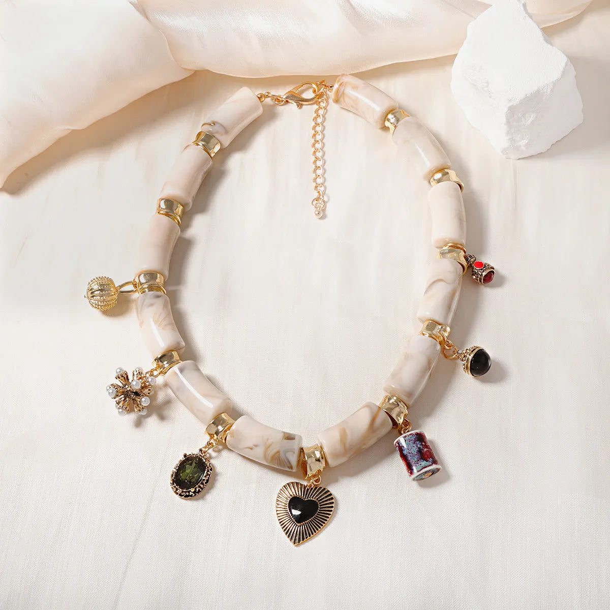Heart-shaped resin bamboo necklace with electroplated finish in picture colour