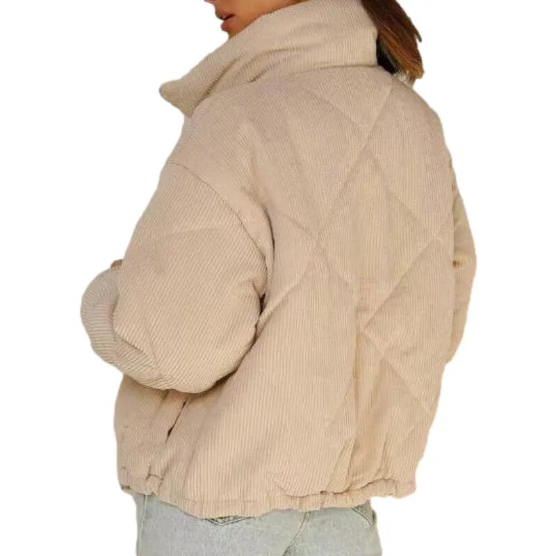 Apricot coloured women's corduroy jacket with a stand collar and full-length zipper.