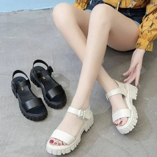 Women's beige peep toe platform sandals with an ankle-strap buckle on a white background.