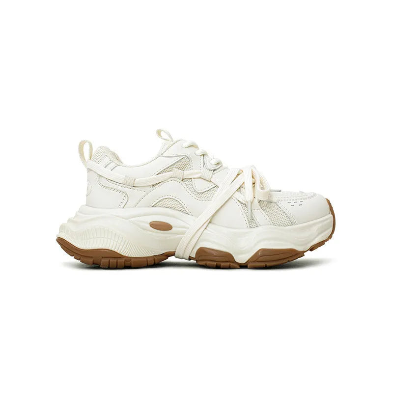 Milky white women's platform running sneaker with microfiber upper and front laces.
