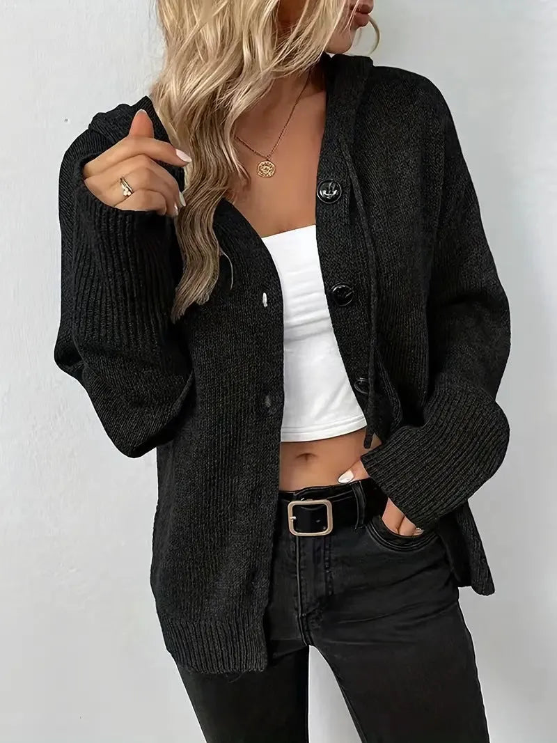 A solid colour loose-fit hooded cardigan sweater made from thick cotton fabric.