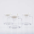 Transparent plastic drinking cup with a simple, modern design on a plain background.