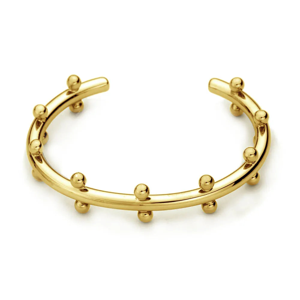 Stainless steel C-shaped bead with textured rivet detail and an alloy bracelet.