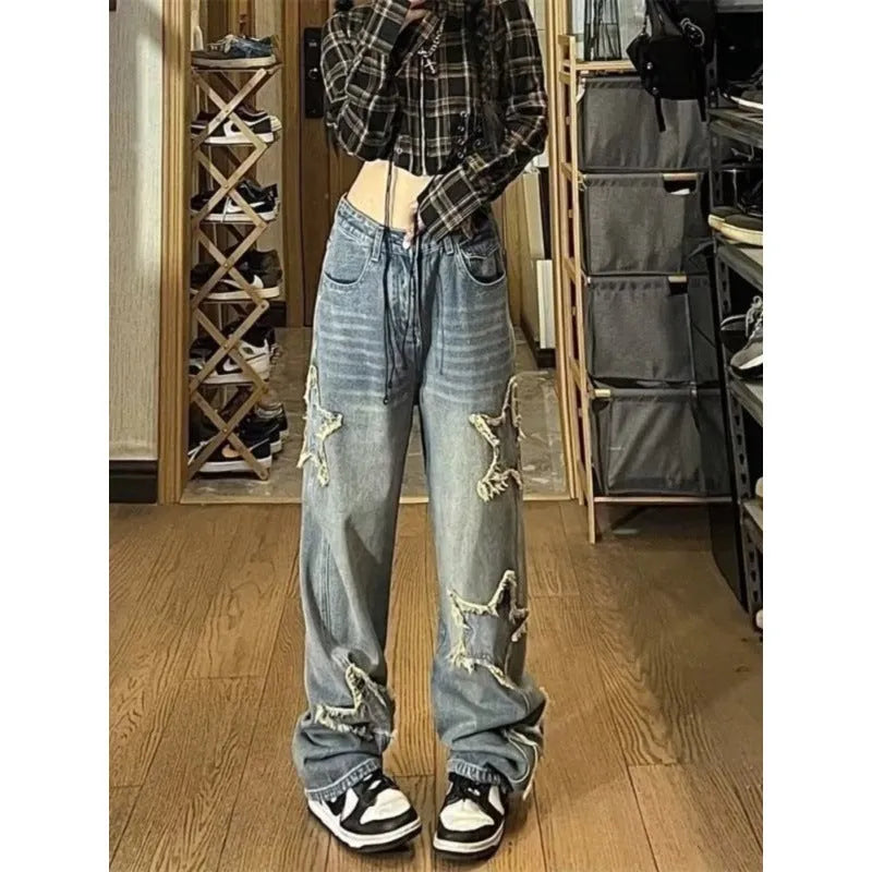 Blue high-waist straight-leg women's jeans on a model, showing the front and side fit.
