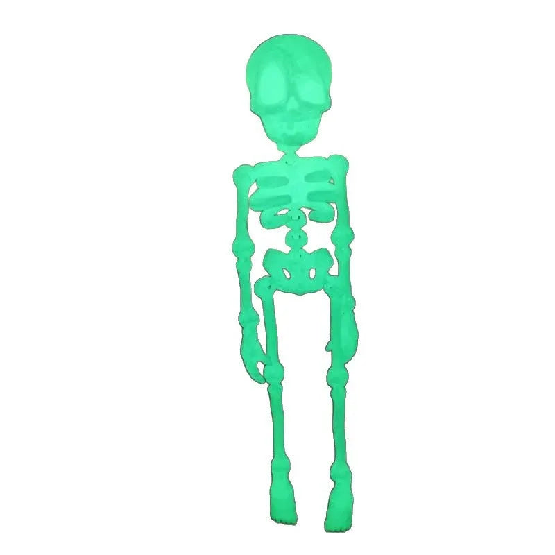 3D printed white skull refrigerator magnet with detailed model on a kitchen fridge.
