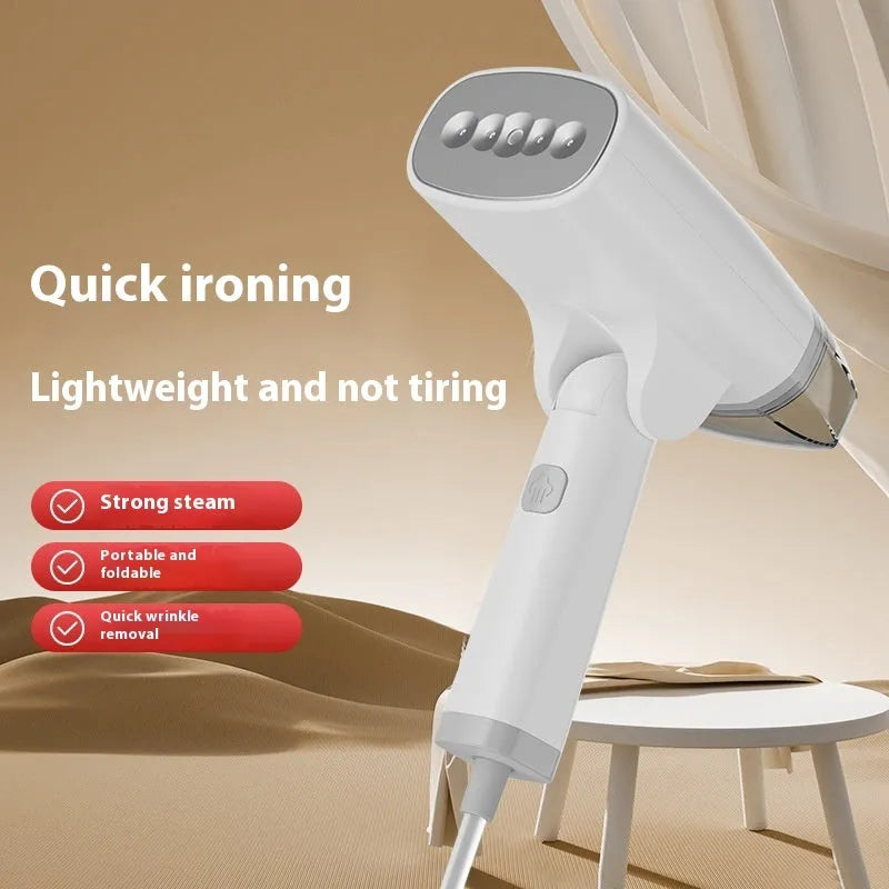 Blue handheld garment steamer with water tank and temperature control buttons