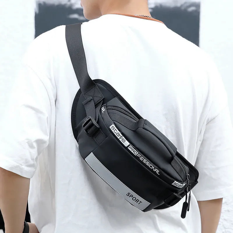 Reflective men's crossbody waist bag in black, small horizontal square shape with zipper closure and nylon waterproof finish