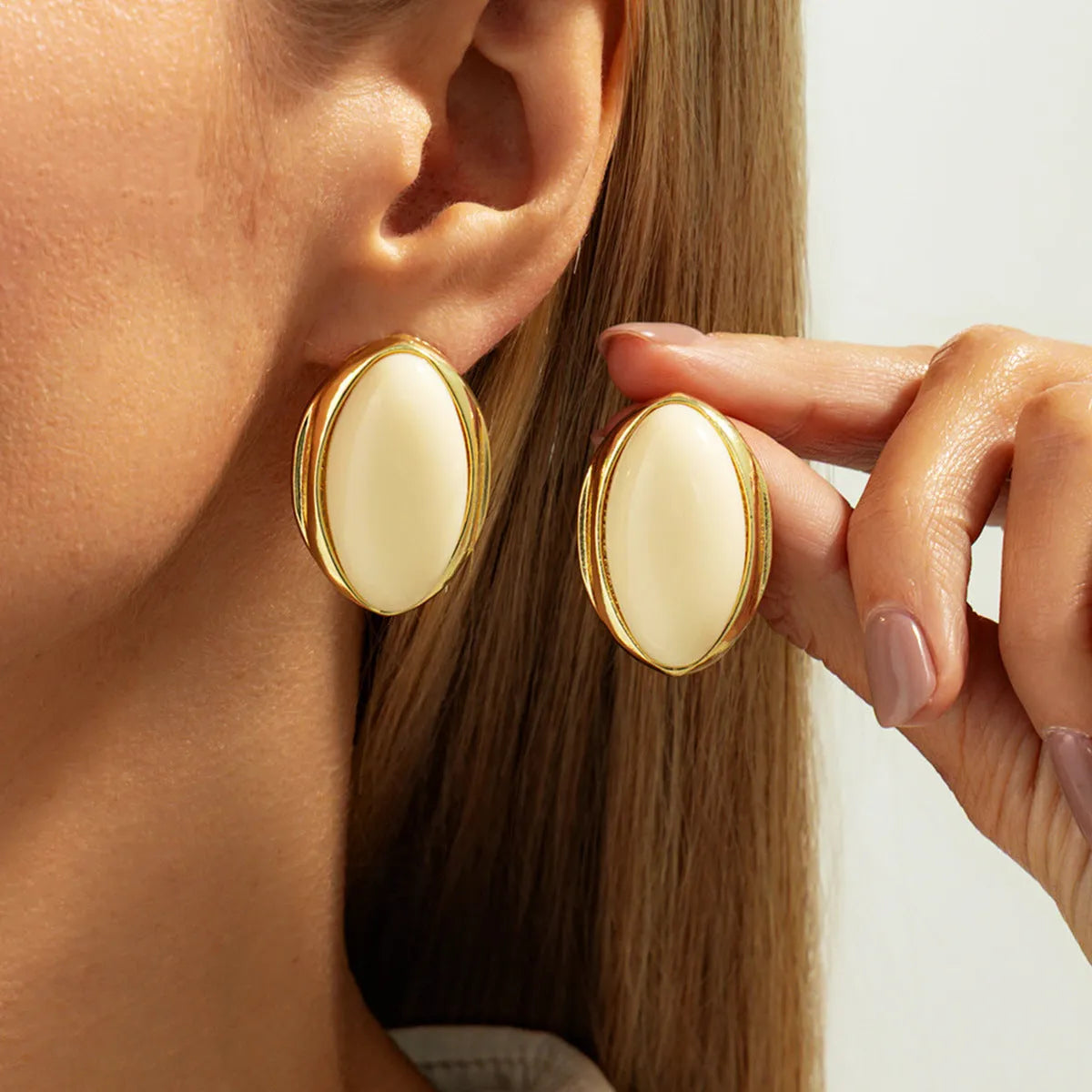 French retro court oval gemstone earrings in electroplated gold with alloy and resin construction